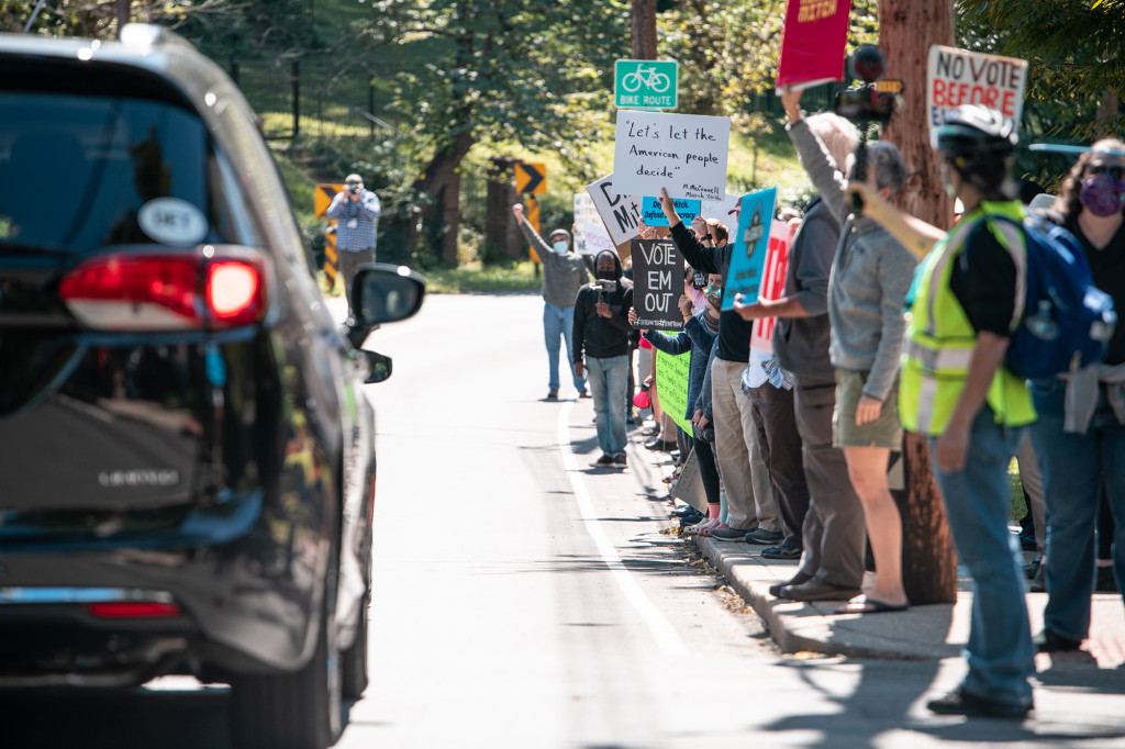 Crowd gathers outside Mitch McConnell’s home to protest
filling SCOTUS vacancy 1