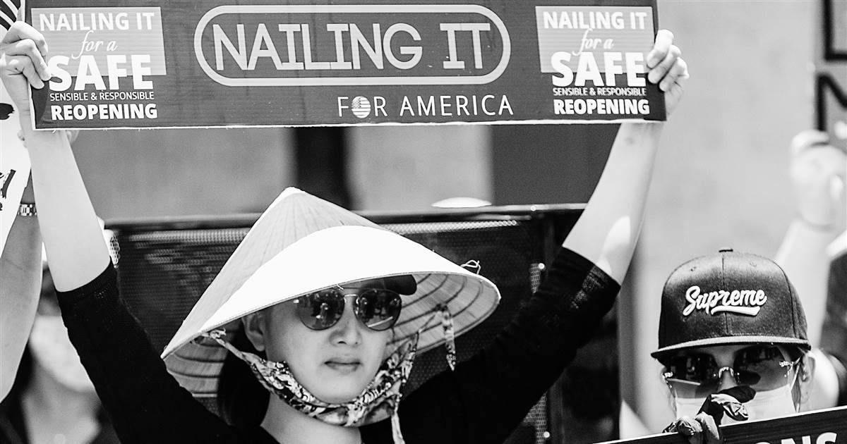 Vietnamese nail salon workers face a triple COVID-19 toll
after being left behind 1