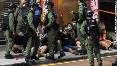Hong Kong police under fire for tackling 12-year-old during
protests 1