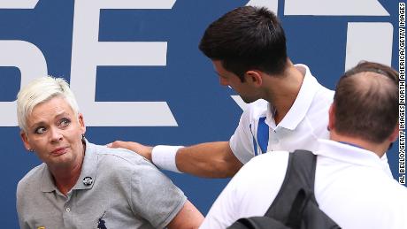 Djokovic defaulted from US Open after striking lineswoman
with ball 1