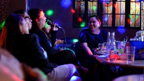 Report noisy karaoke singers to help fight coronavirus,
Philippine governor urges public 1