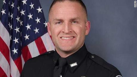 Officer charged in connection to Breonna Taylor's killing
expected to plead not guilty 1