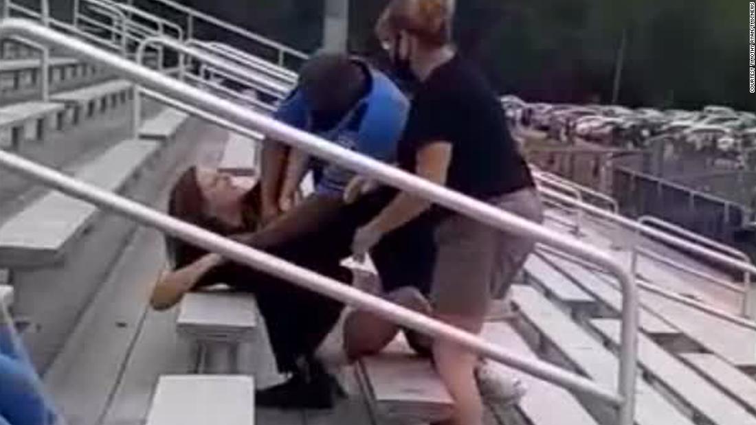 Ohio woman tased after she refused to leave a middle school
football game for not wearing a mask 1