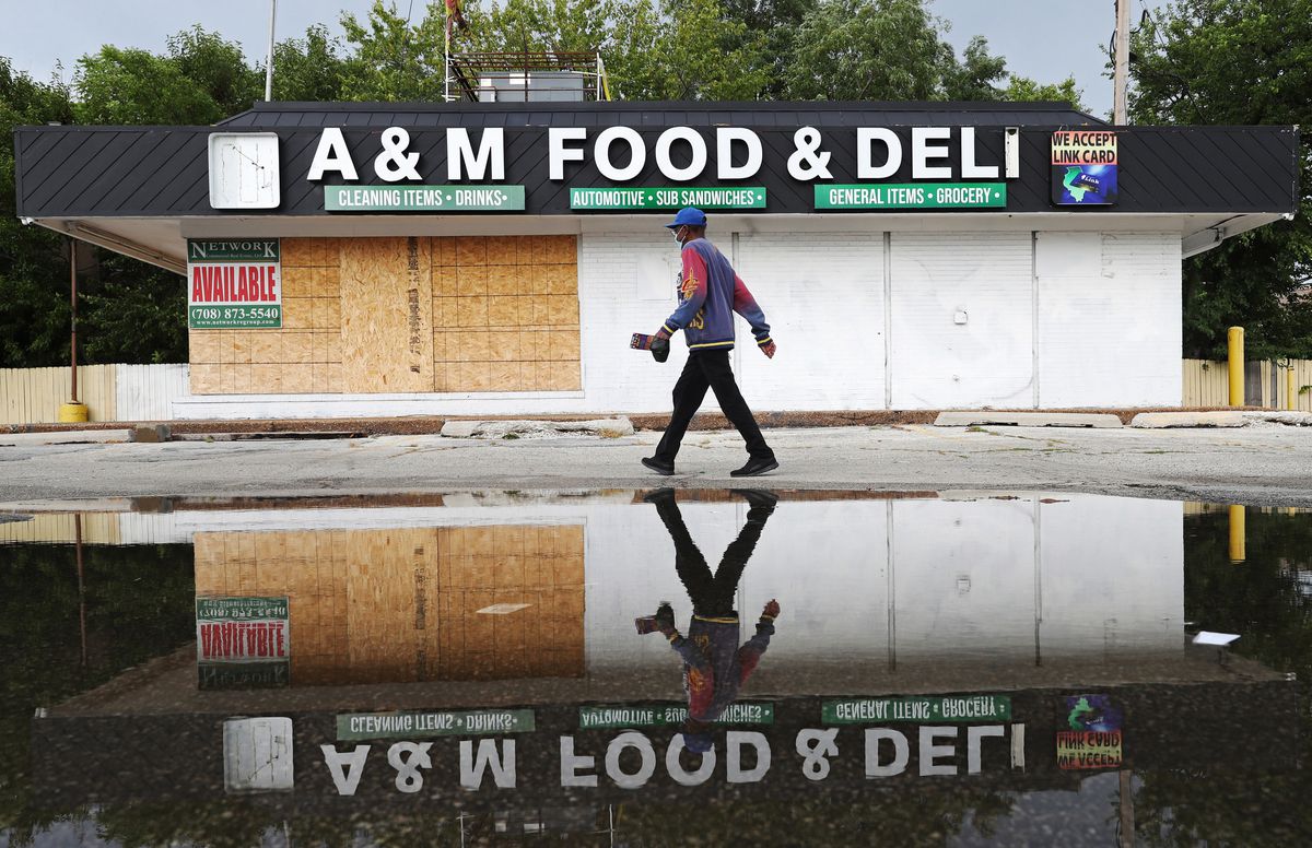 Column: ‘It’s like we’ve been living in a pandemic all
along.’ COVID-19 and recent looting add to setbacks for
long-neglected North Lawndale. 1 Column: ‘It’s like we’ve been living in a pandemic all
along.’ COVID-19 and recent looting add to setbacks for
long-neglected North Lawndale. 1