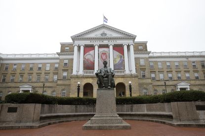 University of Wisconsin-Madison moves classes online,
quarantines students in two dorms as coronavirus cases spike on
campus 1 University of Wisconsin-Madison moves classes online,
quarantines students in two dorms as coronavirus cases spike on
campus 1