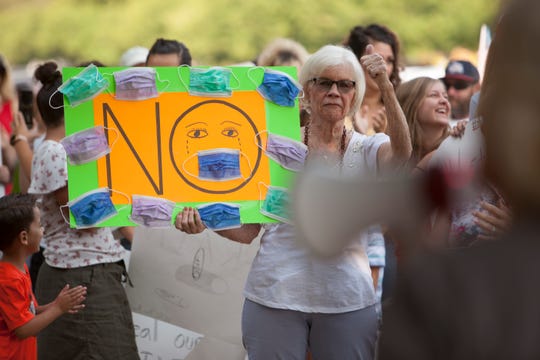 Hundreds of people turned out for an anti-mask protest in
Utah. It's being mocked as 'a straight parody' on social
media. 1