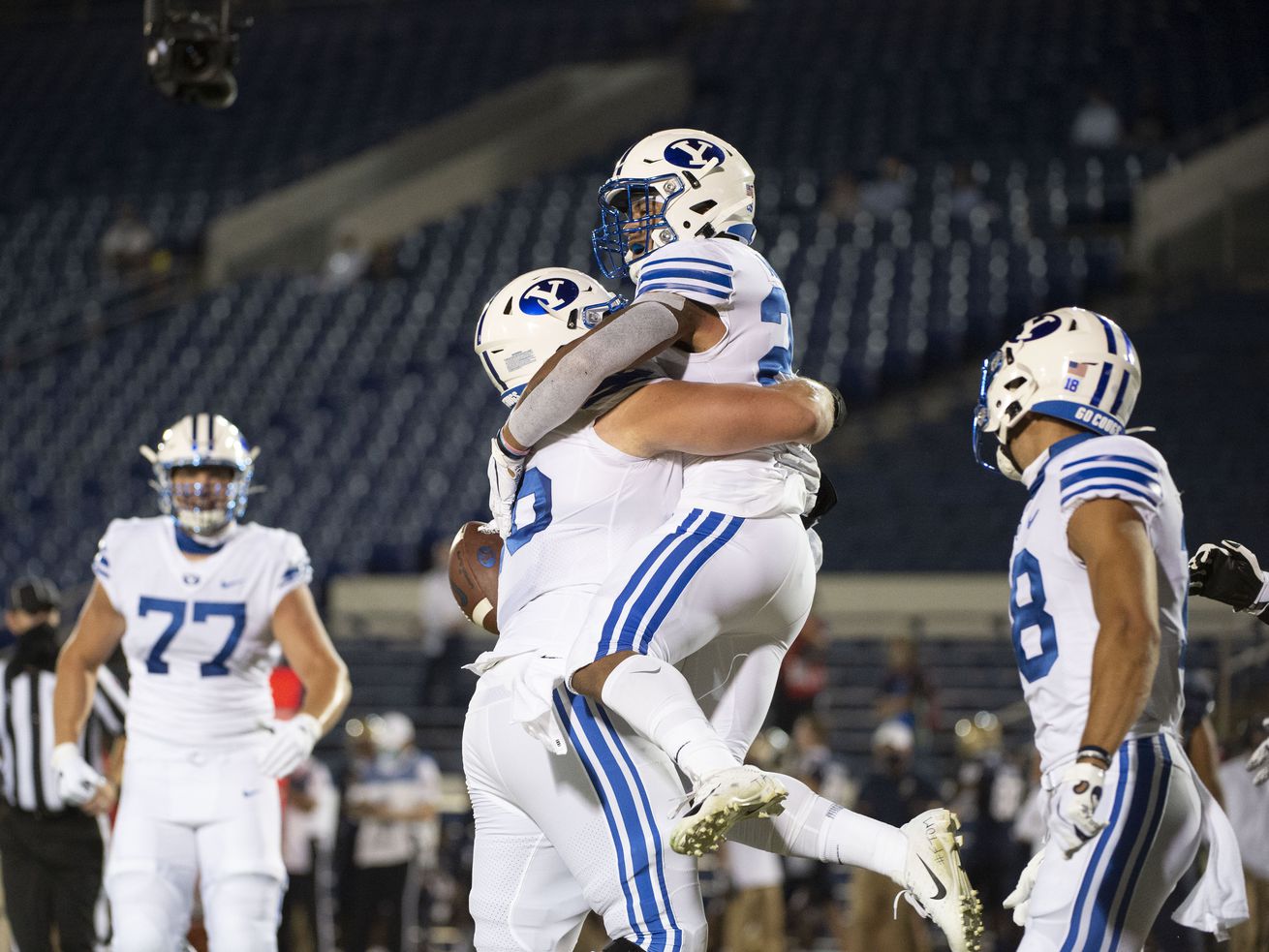 BYU rolls past Navy 55-3 in major college football
season-opener with no fans 1