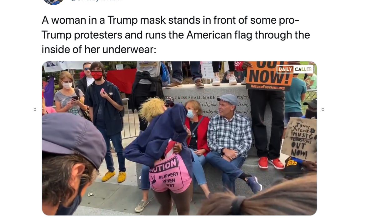 Philly protesters taunt Trump fans with U.S. flag flossed
through pants: 'Stick it in they faces!' 1