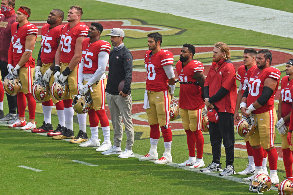 Two 49ers appear to protest during anthem as Cardinals stay
in locker room 1