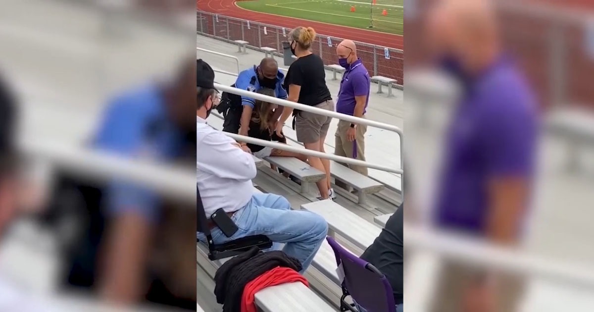 VIDEO: Overweight Cop Tases, Arrests Asthmatic Mom for Not
Wearing Mask at School Football Game 1