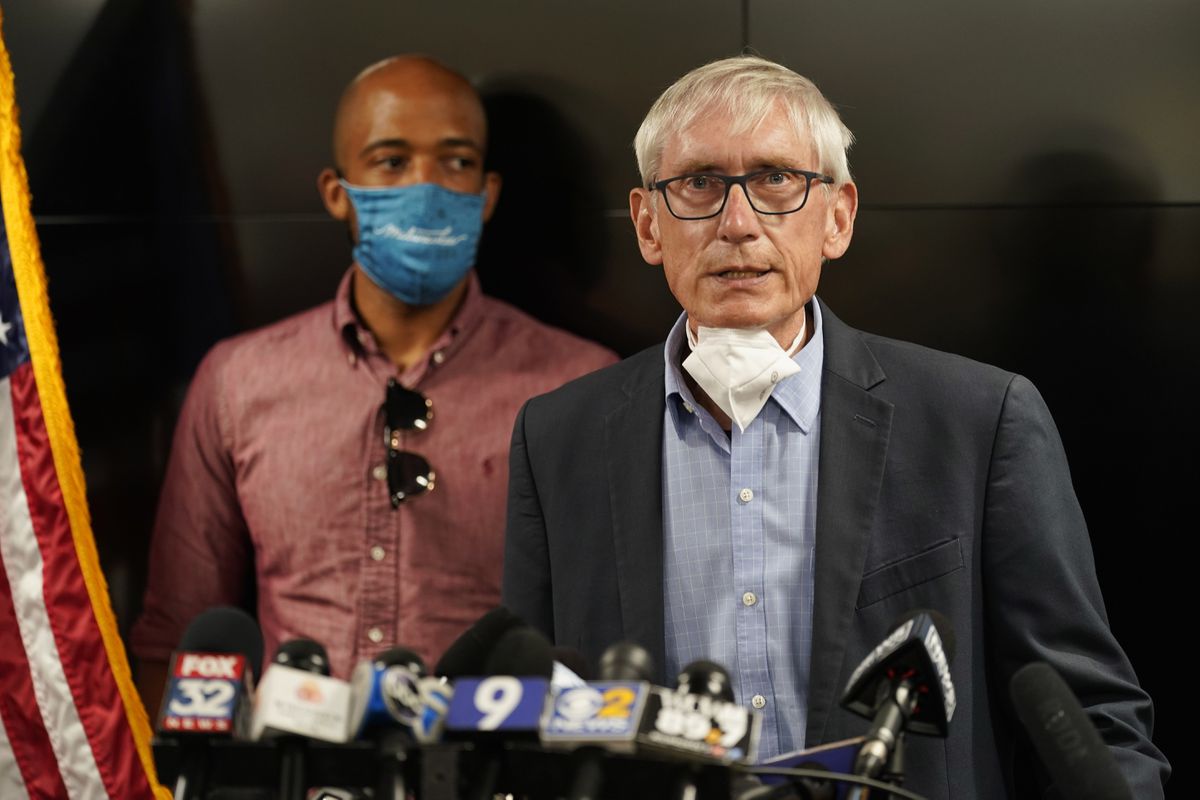 Conservative law firm fights Wisconsin governor’s mask
mandate despite coronavirus surge 1