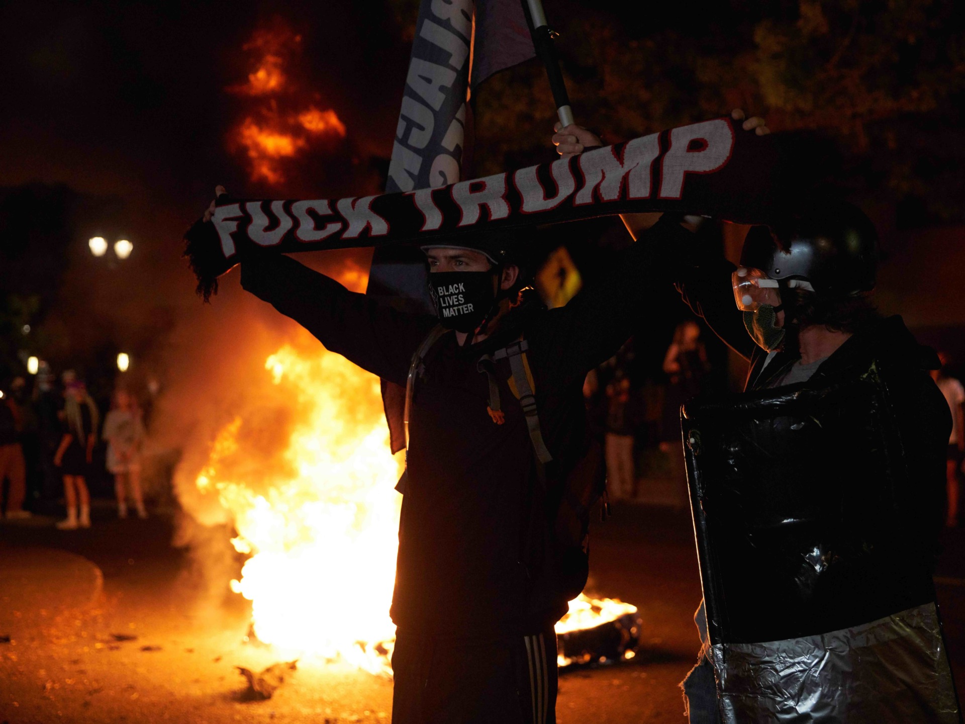 WATCH: Black Female Driver Confronts White Rioters in
Portland 1