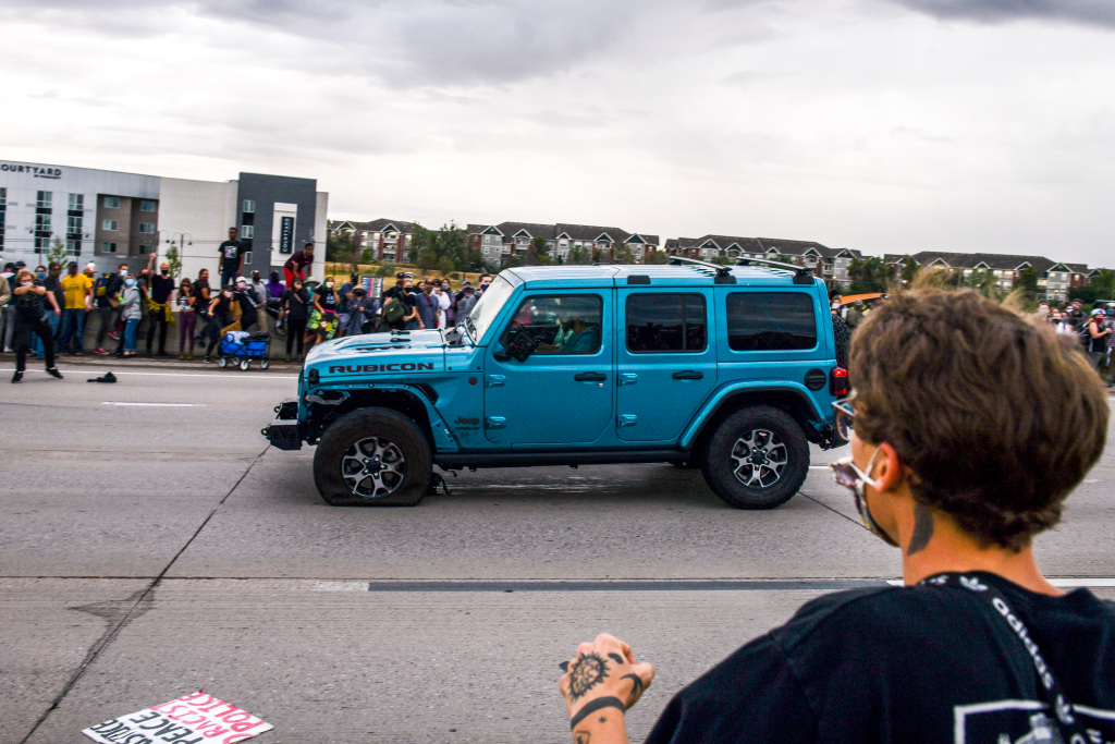No criminal charges for Jeep driver who sped through crowd
of Aurora protesters 1