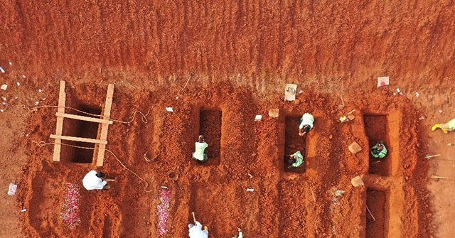 Indonesia Forcing Children Violating Mask Rule to Dig Graves
of Coronavirus Victims 1
