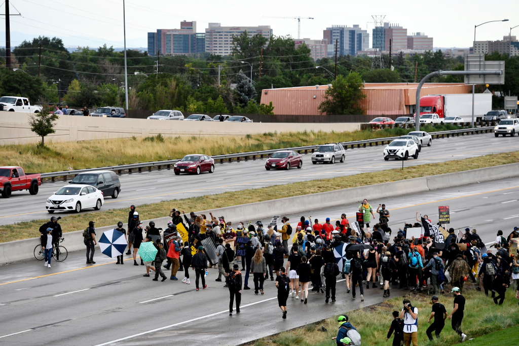 Protesters, demonstration leaders arrested in connection to
rallies in Aurora 1