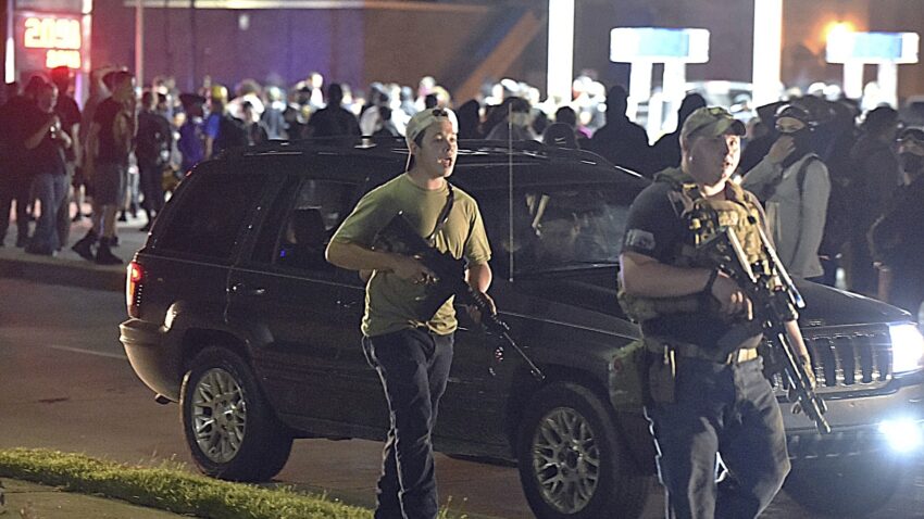 As guns get drawn at protest sites, demonstrators fear a
volatile new phase 1