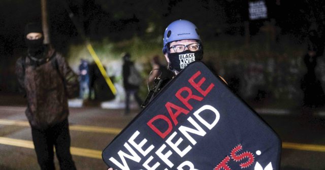 Reports: Portland 'Antifa' Rioters Pay Homage to Man who
Allegedly Shot Trump Supporter 1
