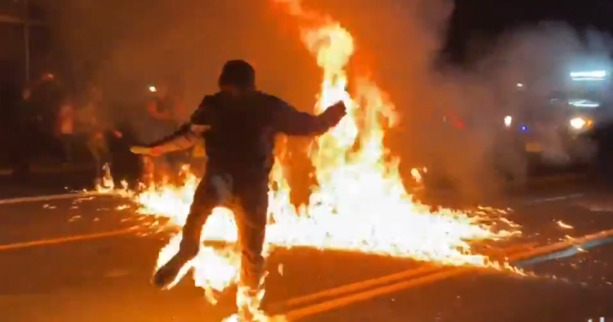 MUST WATCH: Portland Rioter Accidentally Sets Another ANTIFA
On Fire Through Use of a Molotov Cocktail 1