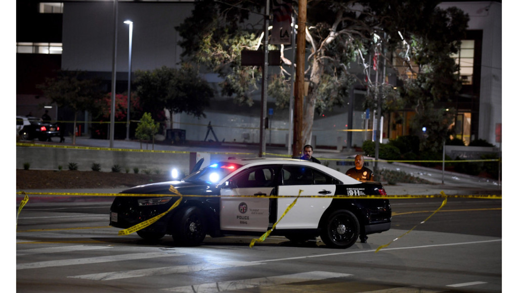 Man takes cop’s gun, opens fire inside California police
station 1