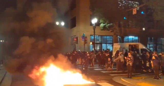 Portland Rioters Set Fire to Minority-Owned Business in
Mayor Ted Wheeler's Condo Building 1