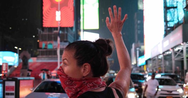 Watch: Car Drives Through Black Lives Matter Protest in
Times Square 1