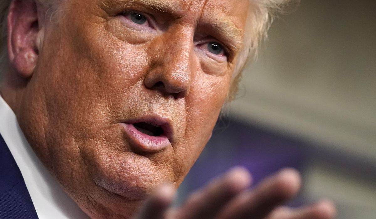 Trump says coronavirus vaccine distribution starting in
October 1