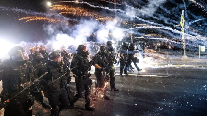 Police Dodge Firebombs as Portland Protesters Mark 100
Straight Days 1