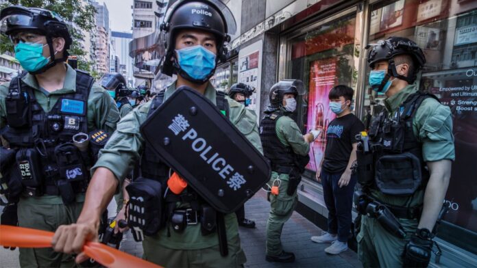 Hundreds of Hong Kong Protesters Arrested After Gov’t Delays
Elections for One Year 1