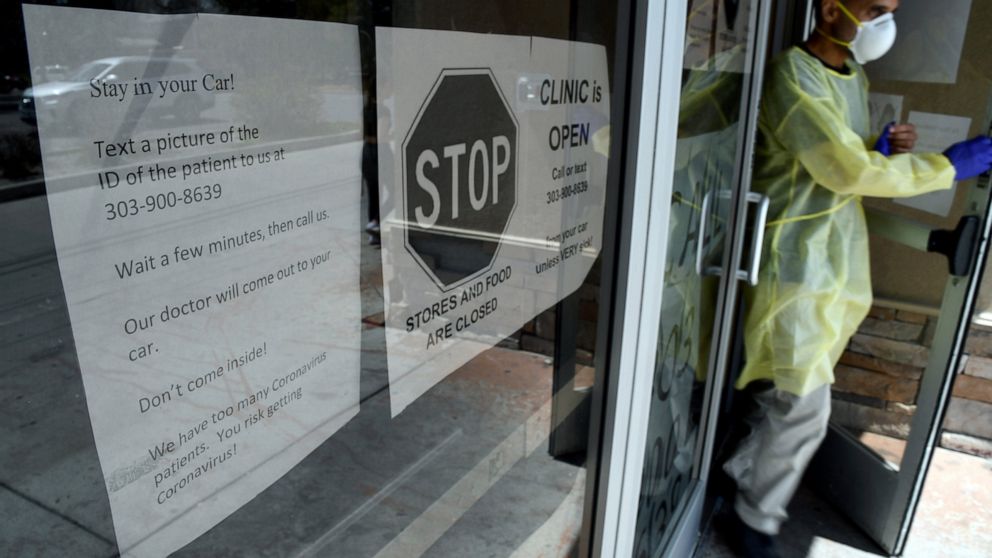 Colorado officer who pointed gun at doctor suspended 1
week 1