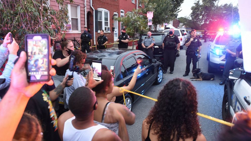 $1M bail cut for some held after protests of police
shooting 1