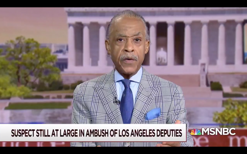 Rev. Al Sharpton Praying for Ambushed L.A. Police Officers
in 'Same Prayer' as Jacob Blake and George Floyd's Family 1