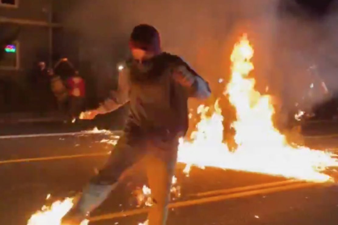 Portland Rioter 'Celebrates' 100 Nights of Riots by Tossing
Molotov Cocktail—and Instantly Regrets It 1