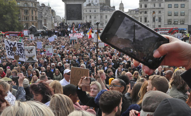 Thousands in London protest lockdowns and social distancing
rules 1