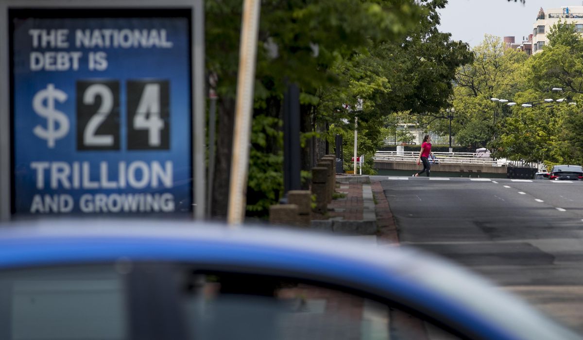 Congressional Budget Office: Federal debt nears
'unsustainable' levels 1