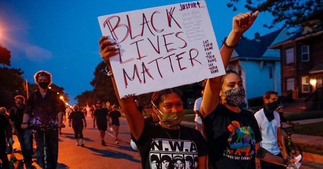 Breonna Taylor Protesters March Down Highway in
Milwaukee 1