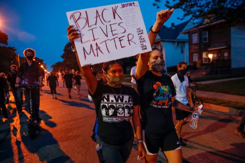 Trump Supporter Who Pointed Shotgun at BLM Protest Outside
His Home Arrested 1
