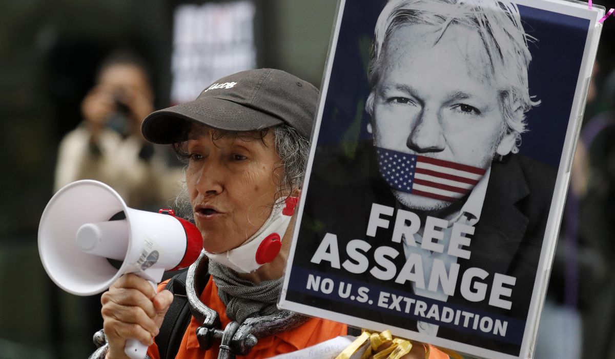 Assange extradition hearing paused over COVID-19
risk 1 Assange extradition hearing paused over COVID-19
risk 1