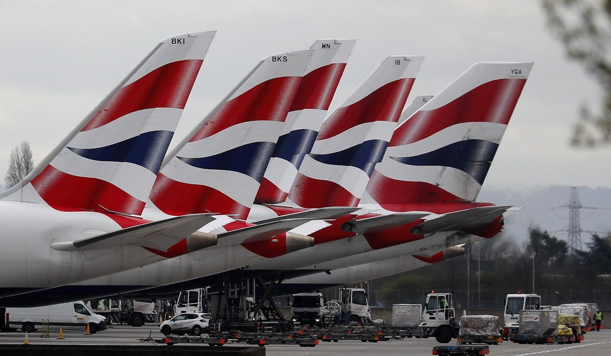 British Airways' parent to cut flights following
quarantines 1 British Airways' parent to cut flights following
quarantines 1