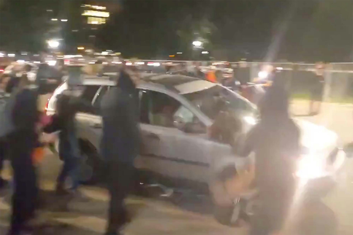 Video shows motorist driving through Breonna Taylor
protesters 1