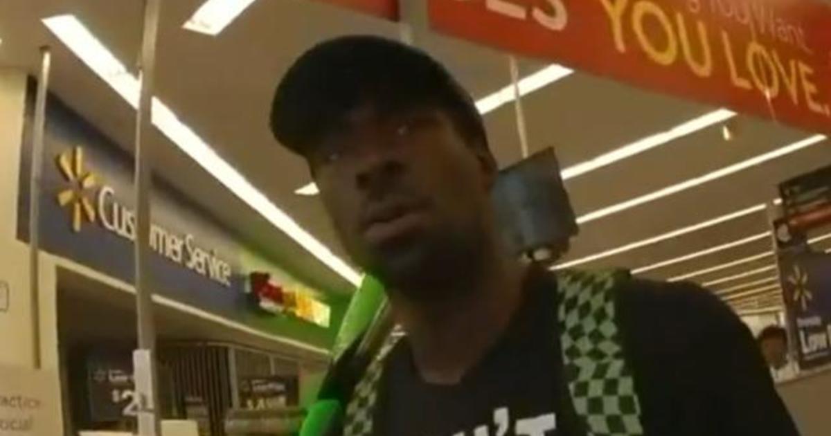 Officer charged in fatal shooting of Black man wielding
baseball bat inside Walmart 1