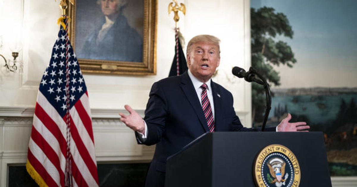 Trump defends his comments downplaying coronavirus
threat 1