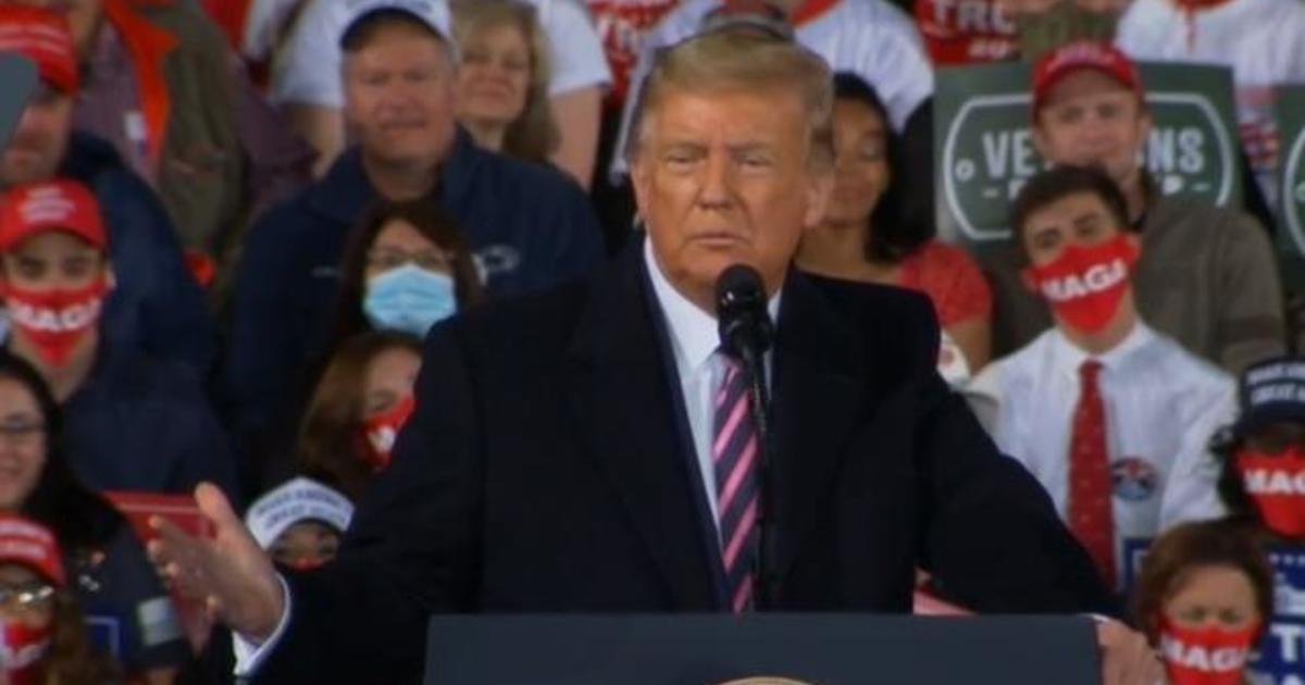 President Trump praises his COVID-19 response at largely
maskless outdoor rally 1