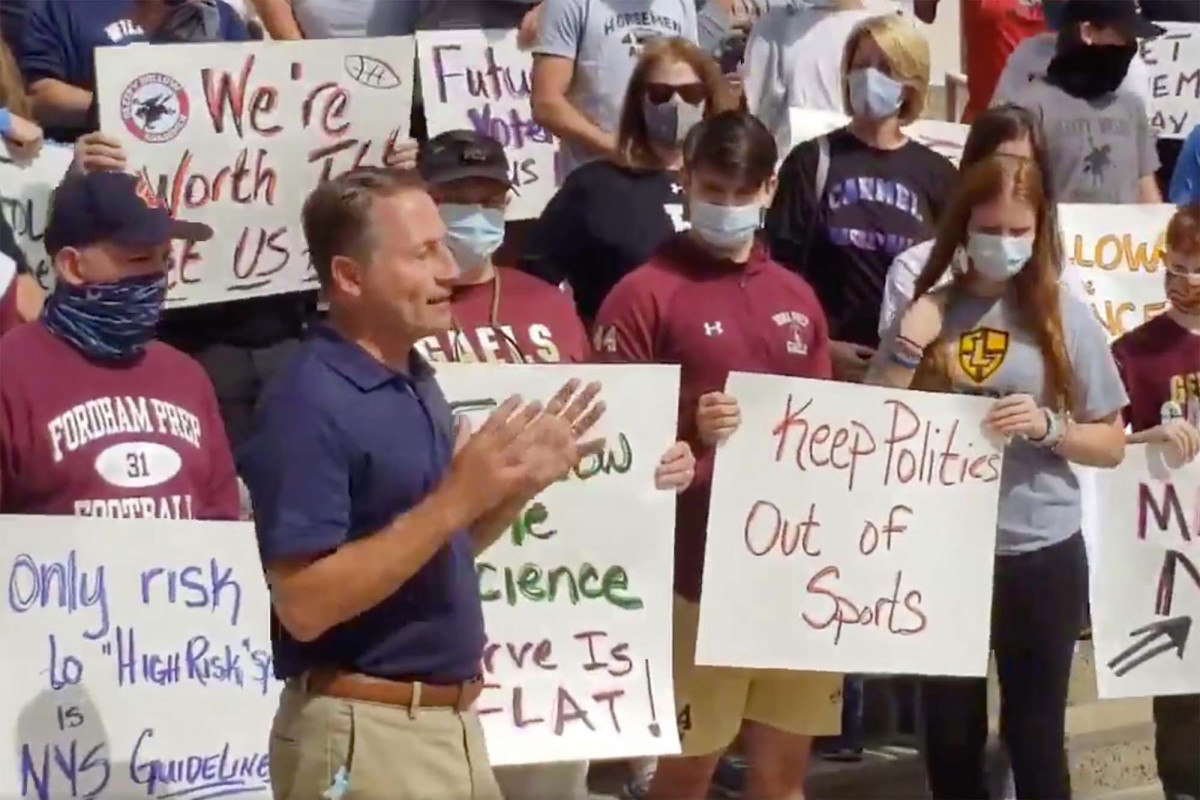 New York high school football players protest fall season
cancellation 1