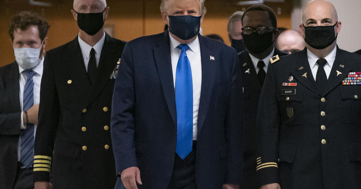 Trump says he wears masks "when needed" and mocks Biden's
masks 1