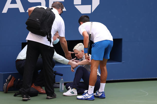 Djokovic out at U.S. Open for hitting linesperson with
ball 1