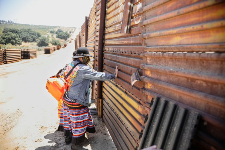 Woman Attacks Native American Tribe Members Protesting
Trump's Border Wall 1