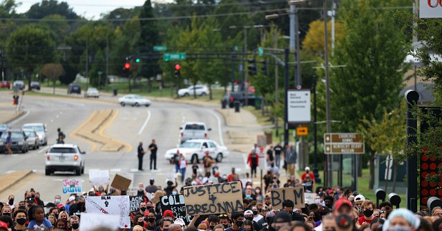 'We Are Going to War:' Some Armed Protesters Gather in
Louisville Days After Officers Shot 1