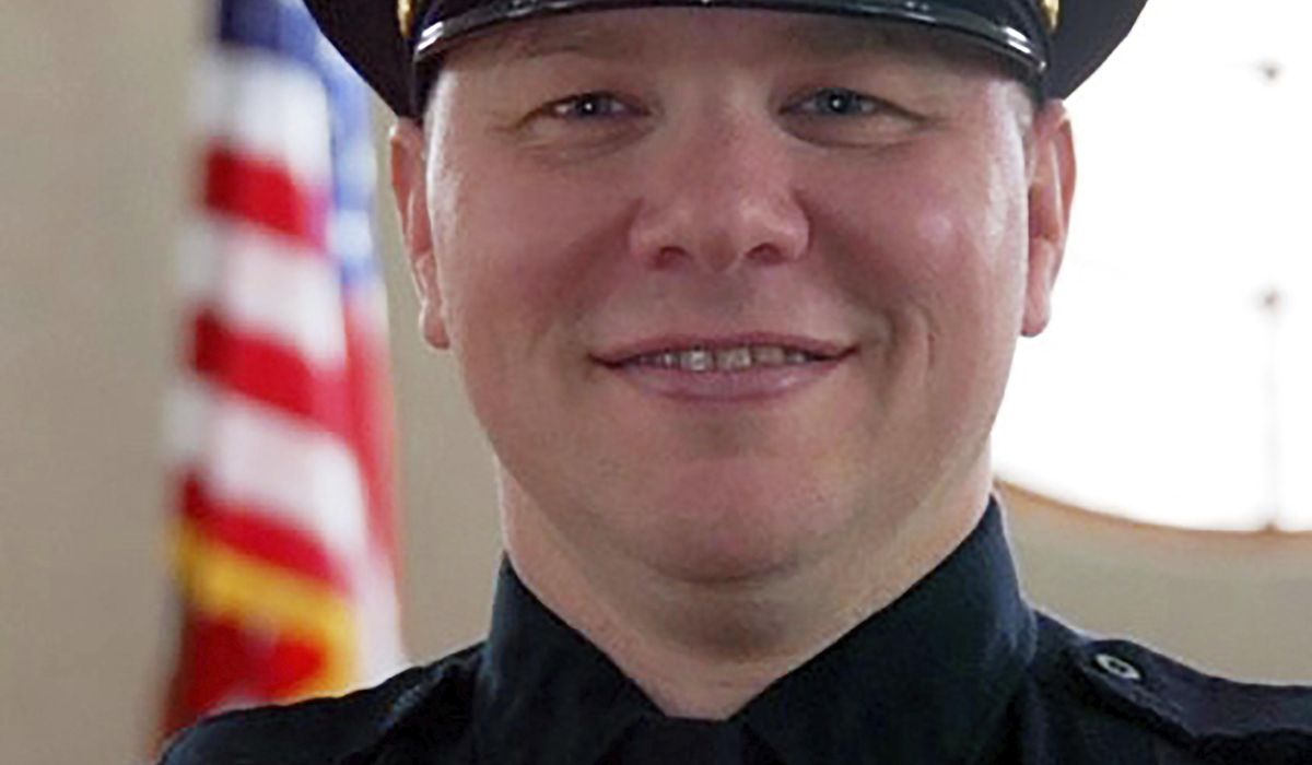 Teen indicted in slaying of Cleveland officer,
informant 1