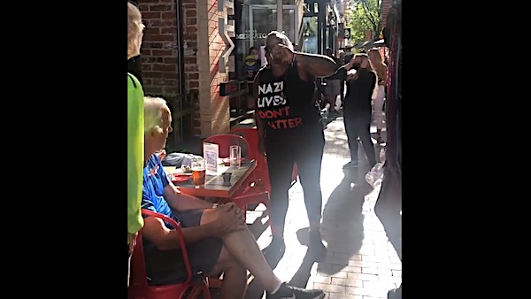 'We don't target businesses,' says protester who screamed at
diners 1