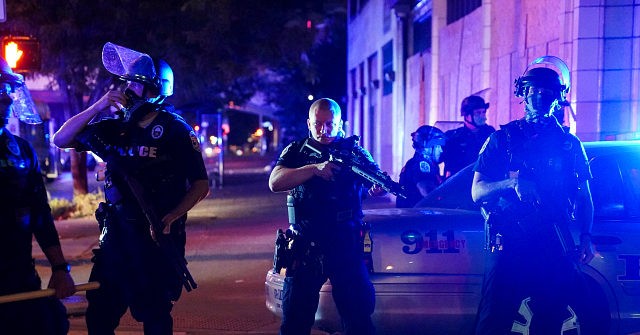 Donald Trump Blames Democrat 'War on Cops' for Shooting of
Kentucky Police Officers 1